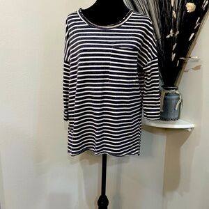 Umgee Sz SM black and white stripes, relaxed fit, and roughed edge neckline